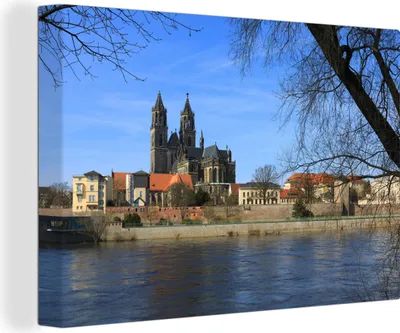 Produktbild von MuchoWow® - Leinwandbilder - Blauer Himmel über Magdeburg in Deutschland, Wandbild, Wanddeko Bilder Wohnzimmer, 120x80cm