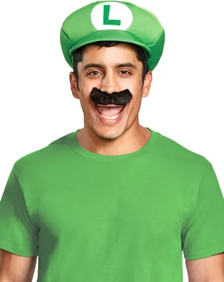 A man wearing a Luigi costume, including a green hat with an 'L' logo and a fake mustache.