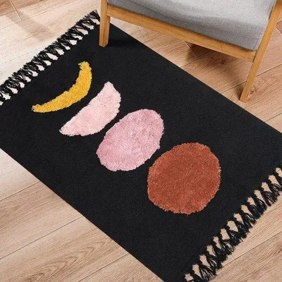 Productafbeelding van Famanu vloerkleed, 60 x 90 cm - Boho, zwart met geweven franjes