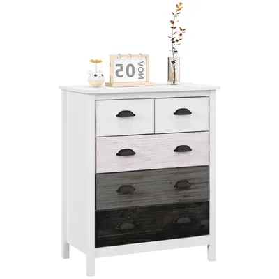 A white dresser with five drawers of varying colors and black handles, placed on a white background. Decorative items, including a small figurine and a vase with branches, sit on top of the dresser.