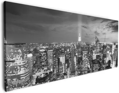 Produktbild von Wallario Premium Leinwandbild New York bei Nacht - Panoramablick über die Stadt - schwarzweiß in Größe 60 x 150 cm