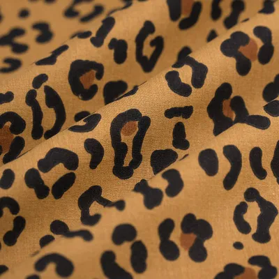 Productafbeelding van Cretonne luipaardprint, bruin, 150 cm, katoenen stof, gecertificeerd met