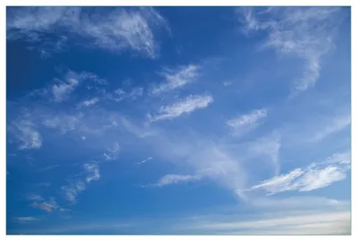 Produktbild von Wallario Küchenrückwand aus Glas, Größe: 90 x 60 cm, Motiv: Blauer Himmel mit vereinzelten Wolken | Spritzschutz | abwischbar | pflegeleicht | in