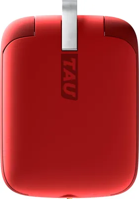 A close-up view of a red electronic device with a silver loop and the word TAU printed on it.