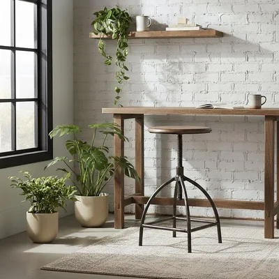 Produktbild von Broste Copenhagen Drehhocker Sire Mangoholz Eisen natur