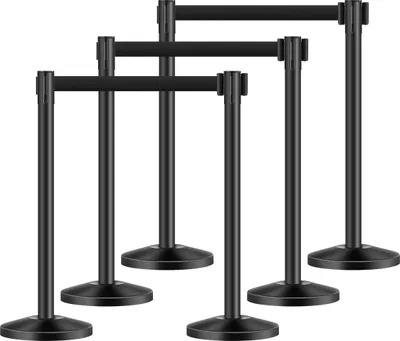 A set of black stanchions with retractable belts, arranged in a staggered formation against a white background.