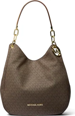 A studio shot of a Michael Kors handbag.