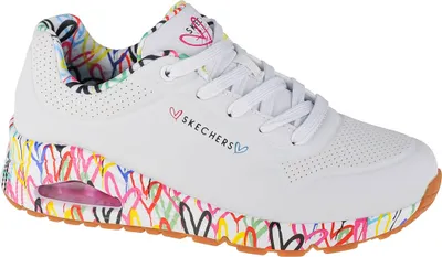 A white Skechers sneaker with a colorful heart print on the sole and lining.