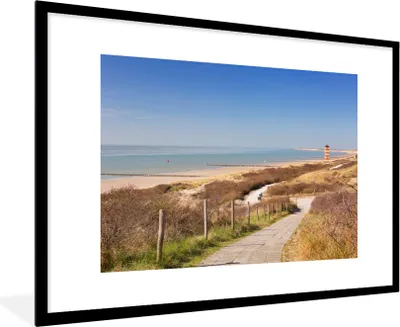 Produktbild von MuchoWow® MuchoWow® Gerahmtes Poster Strand - Meer - Leuchtturm - Niederlande 90x60 cm - Poster mit zchwarzem Bilderrahmen - Wanddekoration - Fotos