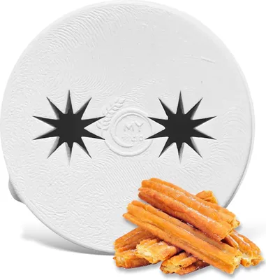 A white circular object with star-shaped cutouts and churros in the foreground.