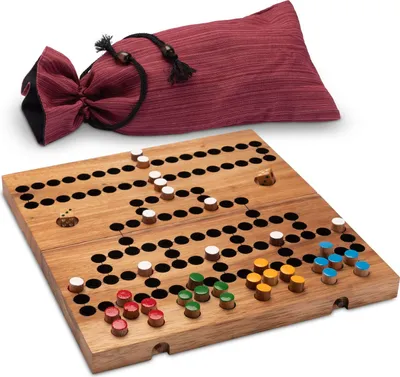 A wooden board game with colorful playing pieces and a red fabric storage bag.