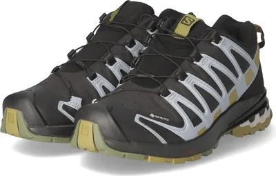 A pair of black Salomon XA Pro 3D V8 GTX trail running shoes with yellow and gray accents, shown from a slightly elevated front-left angle on a white background.
