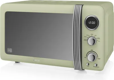 A retro-style green microwave oven is shown from a front-side angle against a white background.
