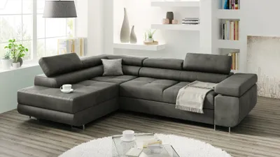 A modern living room with a large sectional sofa.