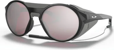 A pair of Oakley Clifden sunglasses with pink lenses and a matte black frame, shown from a three-quarter angle on a white background.