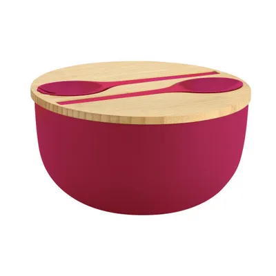 A berry-colored salad bowl with a bamboo lid and two pink serving spoons.