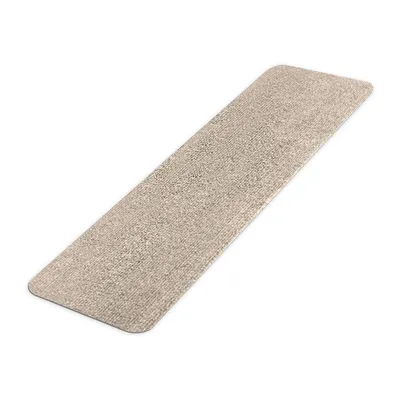 A rectangular beige stair mat with a textured surface is shown on a white background.