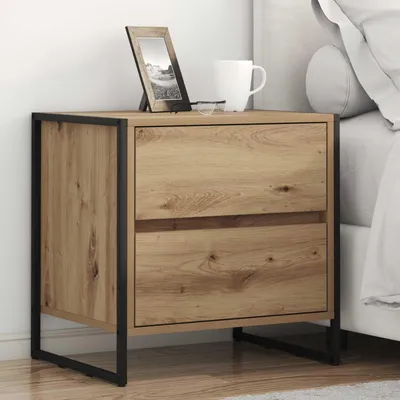 A wooden nightstand with black metal legs is placed next to a bed.