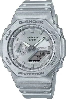 A close-up studio shot of a silver G-Shock watch.