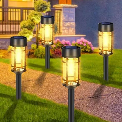 Image de Lot Azomor de 4 lampes solaires résistantes aux intempéries pour l'éclairage du jardin et des allées à l'extérieur