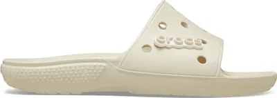 A single cream-colored Crocs slide sandal is shown against a white background.