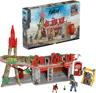 A Fallout Red Rocket Truck Stop building set with figures and accessories, displayed with its packaging.