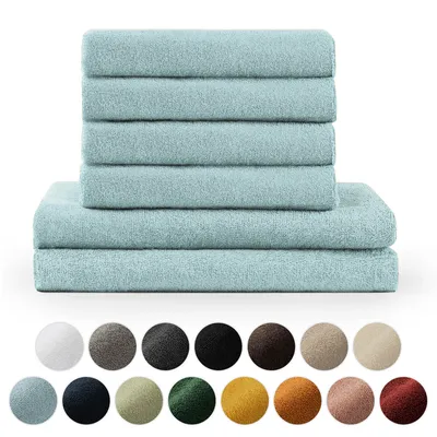 A stack of light blue towels on a white background, with a row of color swatches below.