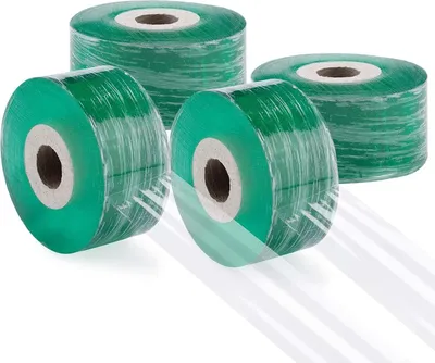Four rolls of green grafting tape are arranged in a group on a white background.
