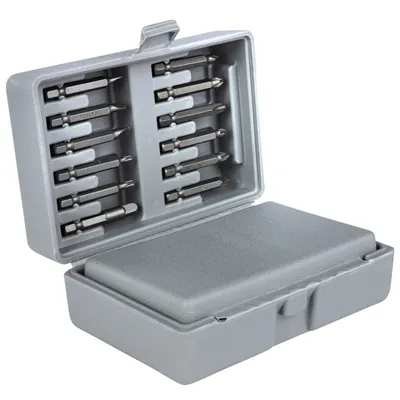 A set of screwdriver bits in a gray plastic case.
