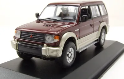 Produktbild von Maxichamps 940163470 Mitsubishi Pajero LWB 1991 dunkelrot metallic 1:43