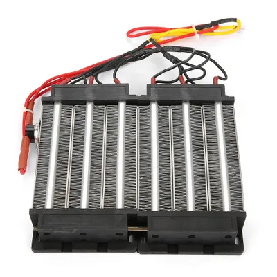 A close-up view of a PTC ceramic fan heater element with wires.
