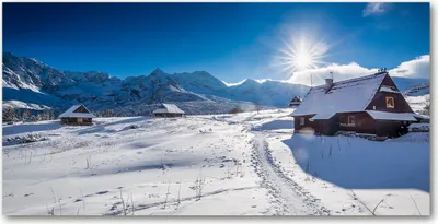 Produktbild von Tulup® Glas-Bild - 100x50 -Wandkunst - Wandbild hinter gehärtetem Sicherheitsglas  - Landschaften - Alm Tatra Bergweide - Weiß