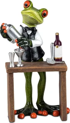 A figurine of a frog bartender mixing a drink behind a small bar.