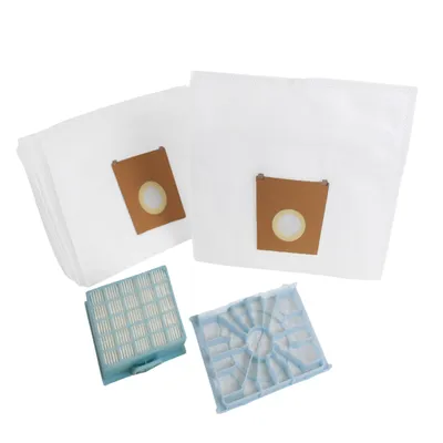 A pile of vacuum cleaner bags and filters on a white background.