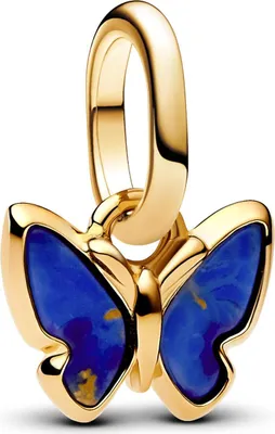 A close-up studio shot of a gold butterfly charm with blue enamel wings.