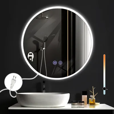 A modern bathroom scene featuring a round, illuminated mirror above a sink.