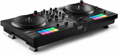 A black DJ controller with two turntables and illuminated pads, shown from a diagonal angle on a white background.