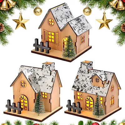 Image de Village de Noël illuminé, comprenant 3 maisons en bois, un effet de neige, des sapins, idéal pour la décoration de table