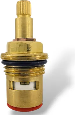 A close-up studio shot of a brass faucet valve stem with a red cap.