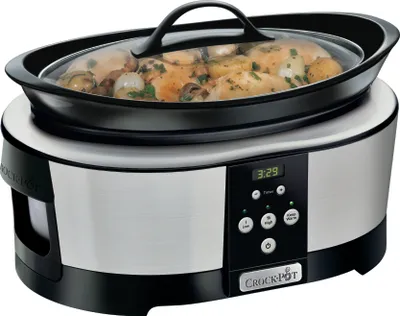 A Crockpot slow cooker filled with food, shown from a slightly elevated front-left angle on a white background.