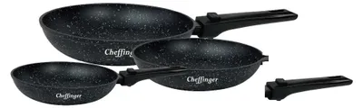 Three black frying pans with speckled surfaces and detachable handles are arranged on a white background.