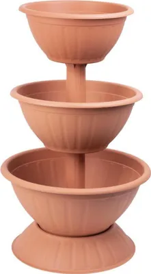 A three-tiered terracotta planter pyramid.