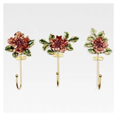 Produktbild von Wandhaken mit Blumenmotiv, 3er-Set, Metallhaken in Vintage-Optik mit rosa Blüten und grünen Blättern, goldfarben