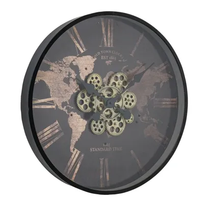 A close-up, angled view of a round wall clock with a world map design and visible gears.