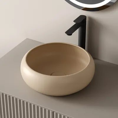 A modern bathroom sink and faucet.