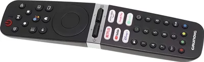 A black remote control with silver accents is shown on a white background.