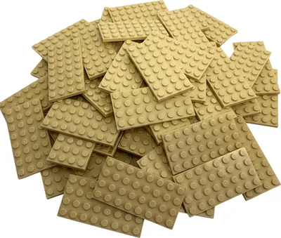 A pile of tan LEGO baseplates.