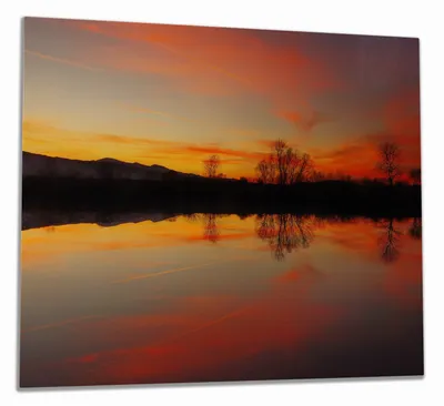 Produktbild von Wallario Herdabdeckplatte aus Glas, Größe 60 x 52 cm 1-teilig, Motiv Abendrot am Himmel über einem See