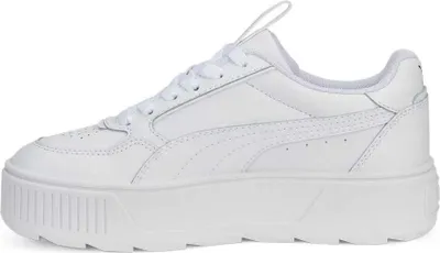 A side view of a white Puma sneaker with a platform sole.