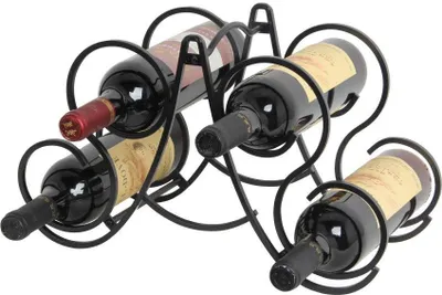 A black metal wine rack holding four bottles of red wine.